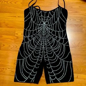 Spiderweb onesie in all black with white design